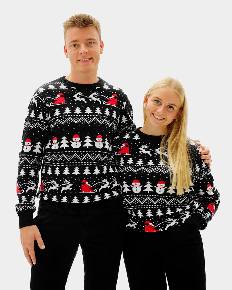 Pull de Noël Homme et Femme Noire Sapins, Bonhommes de Neige et Père Noël