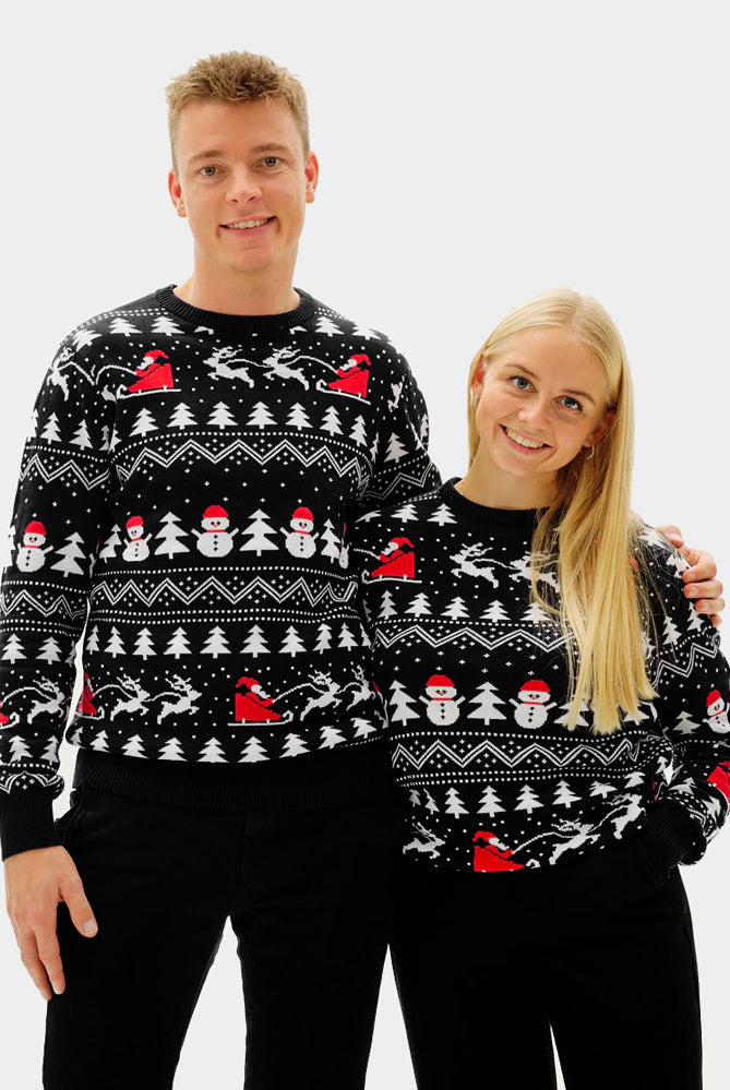 Pull de Noël Homme et Femme Noire Sapins, Bonhommes de Neige et Père Noël